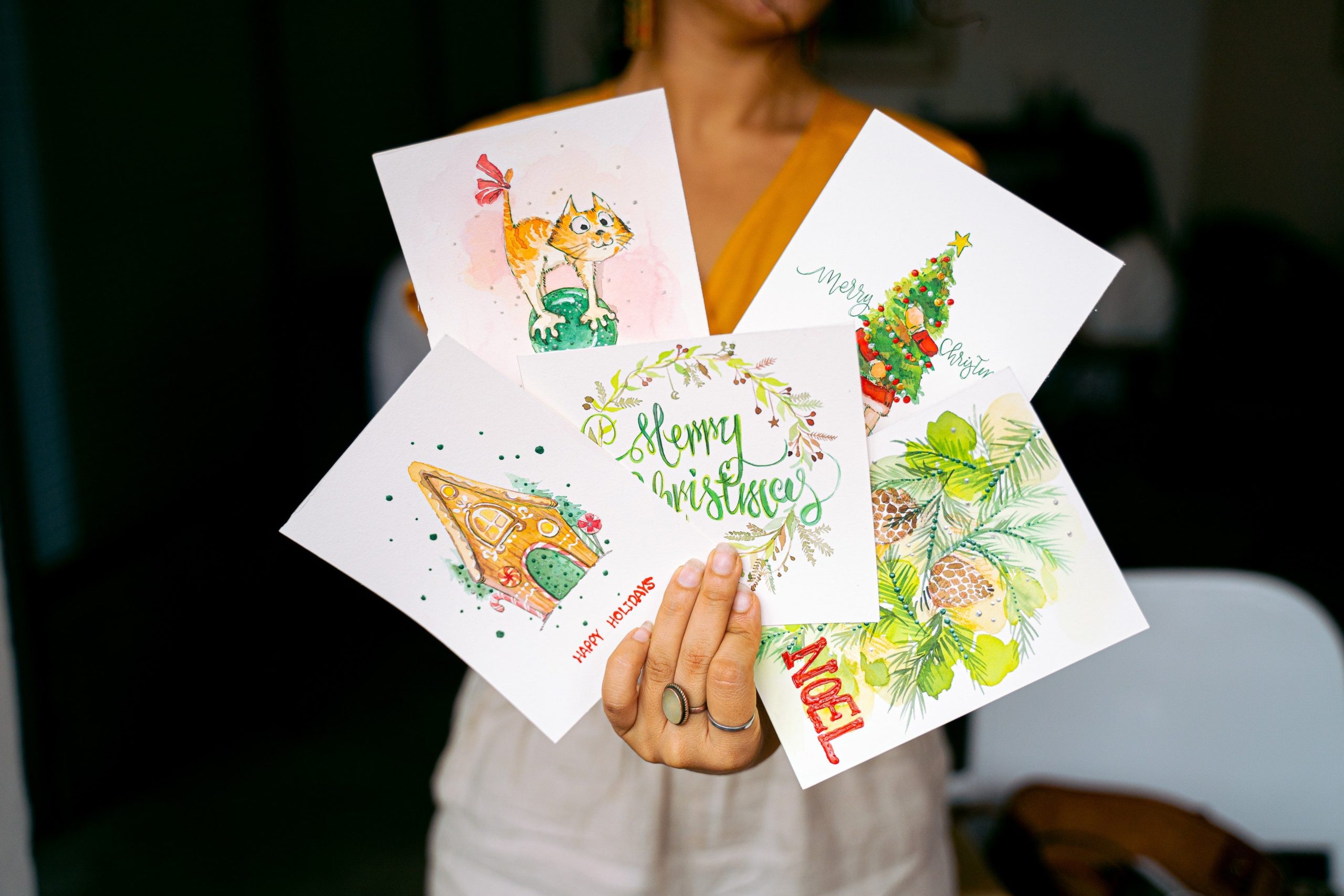 A variety of christmas cards, used to question if christmas cards are sustainable